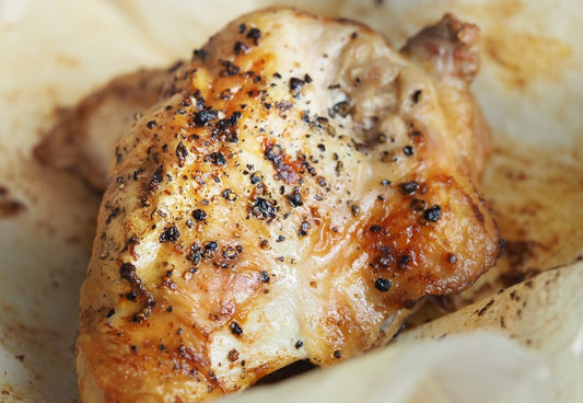 Piece of seasoned and baked chicken breast