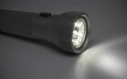 Small black flashlight to help see in the dark