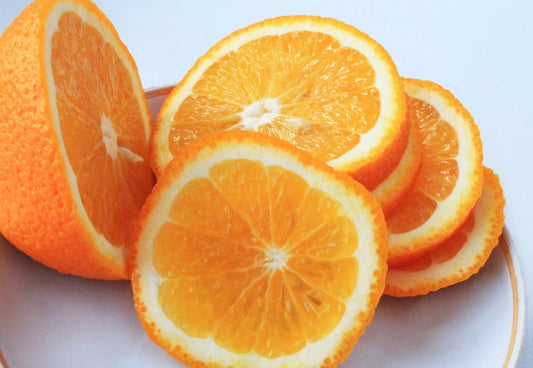 Round orange slices on a plate
