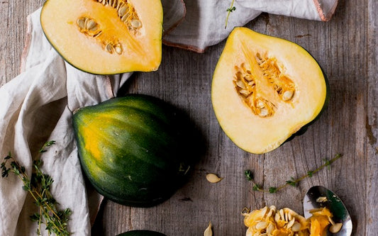 Acorn squash on a cutting board